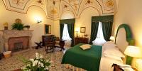 Junior Suite with frescoed ceiling and sea view