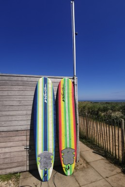 surfboards at the sandy feet retreat